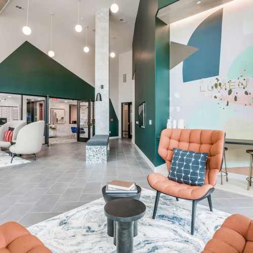 Clubroom with fireplace, multiple seating and work stations