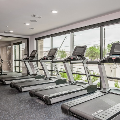 Fitness center with treadmills and unique cycle room