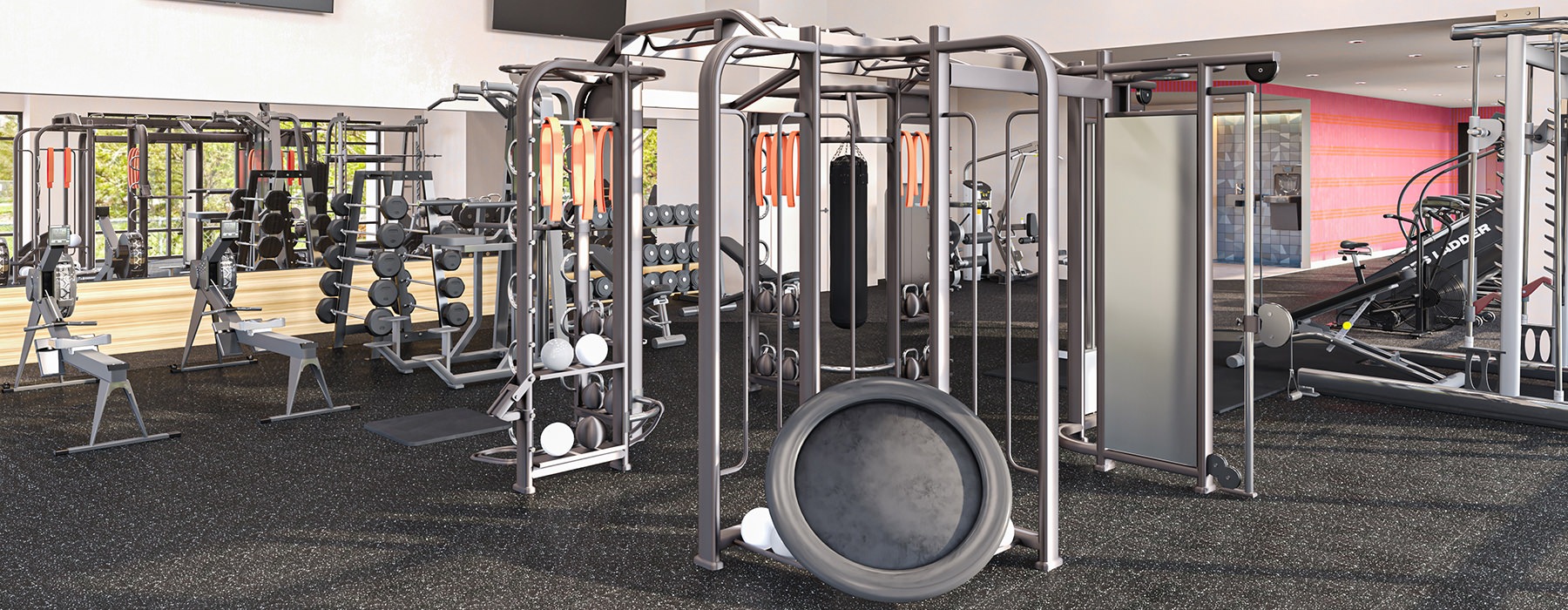 Large well lit fitness center with ample equipment and large windows 
